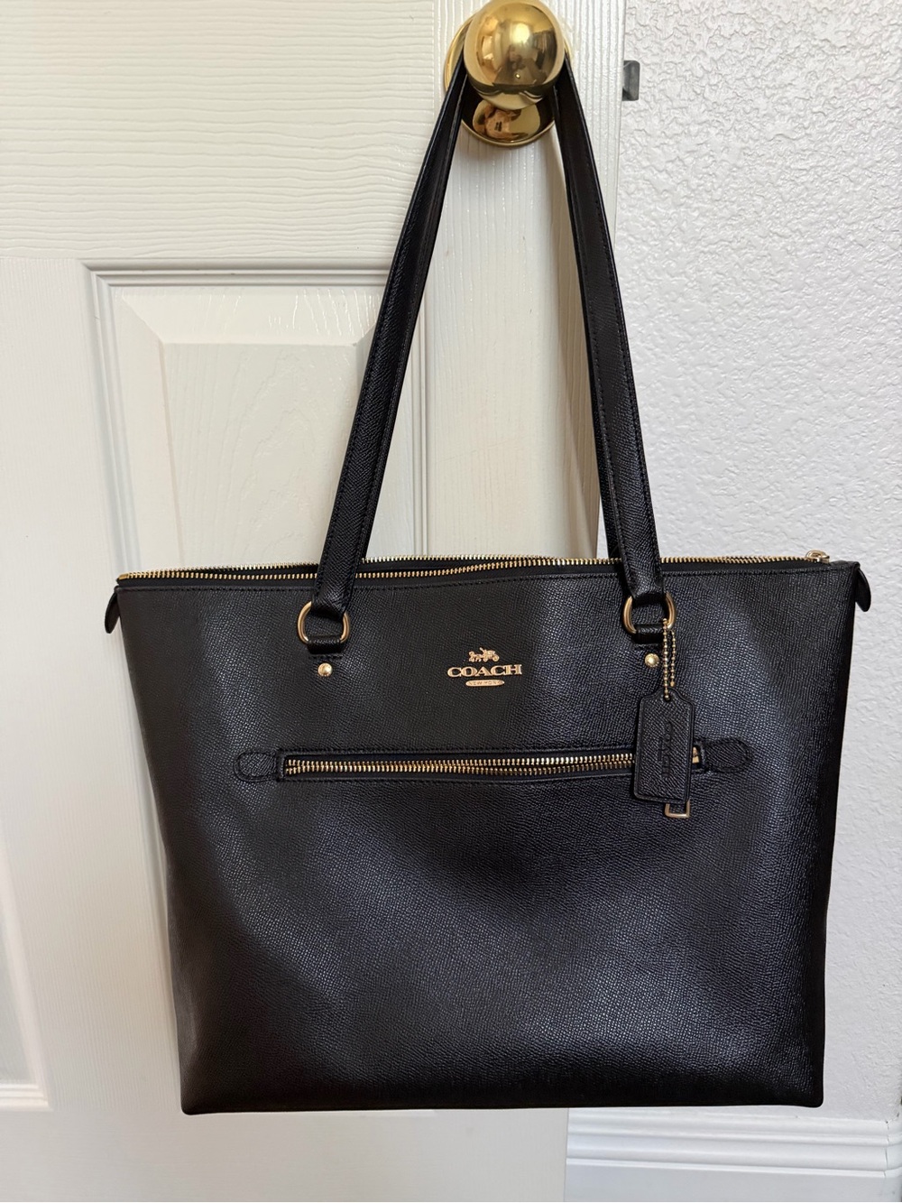 Coach Black Leather Tote with Gold Accents